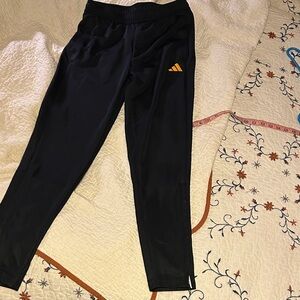 Adidas Black Joggers.Side pockets.Zippers at ankles. Elastic waist w/ drawstring